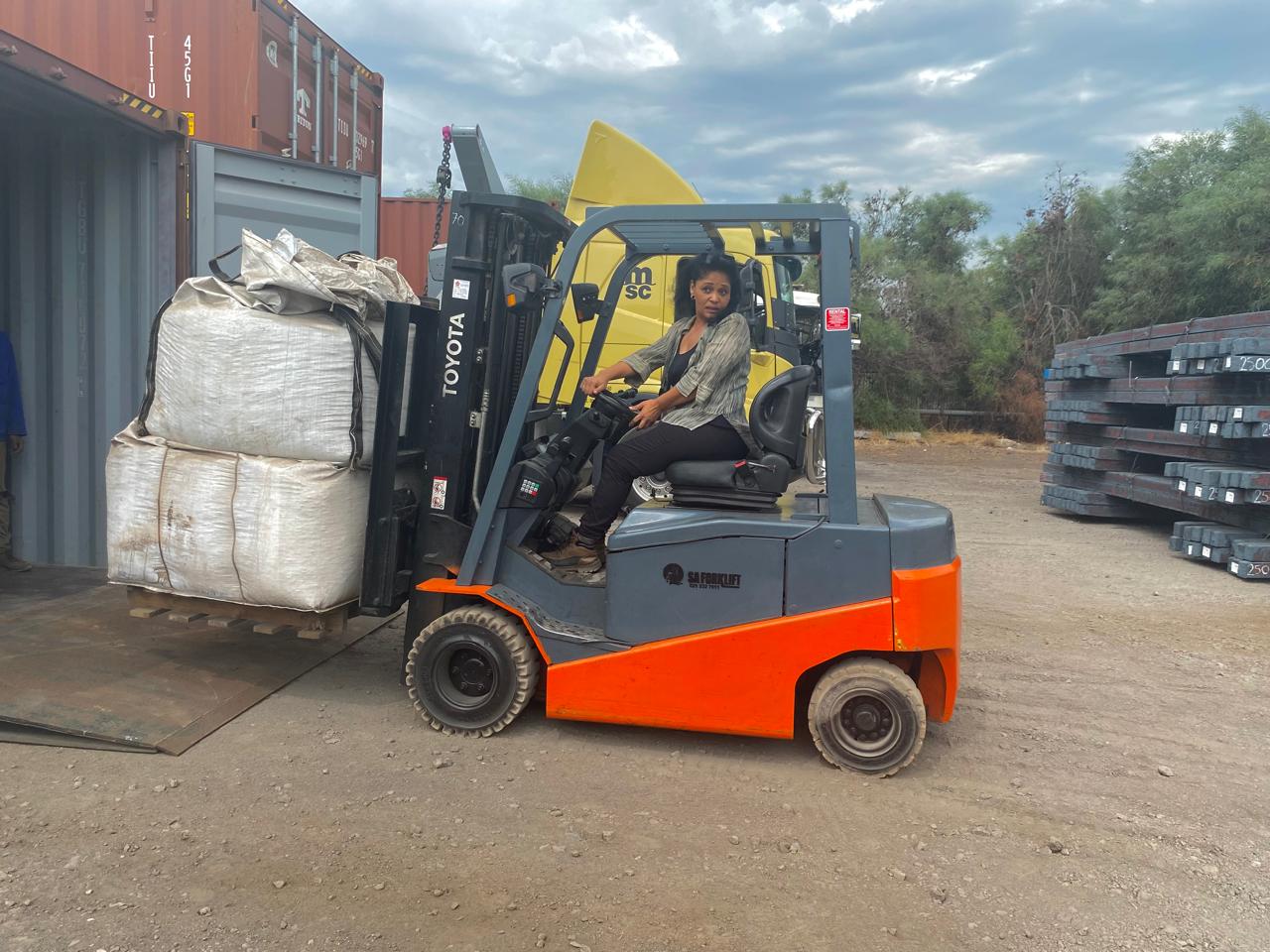 Forklift loading bulk mineral bags